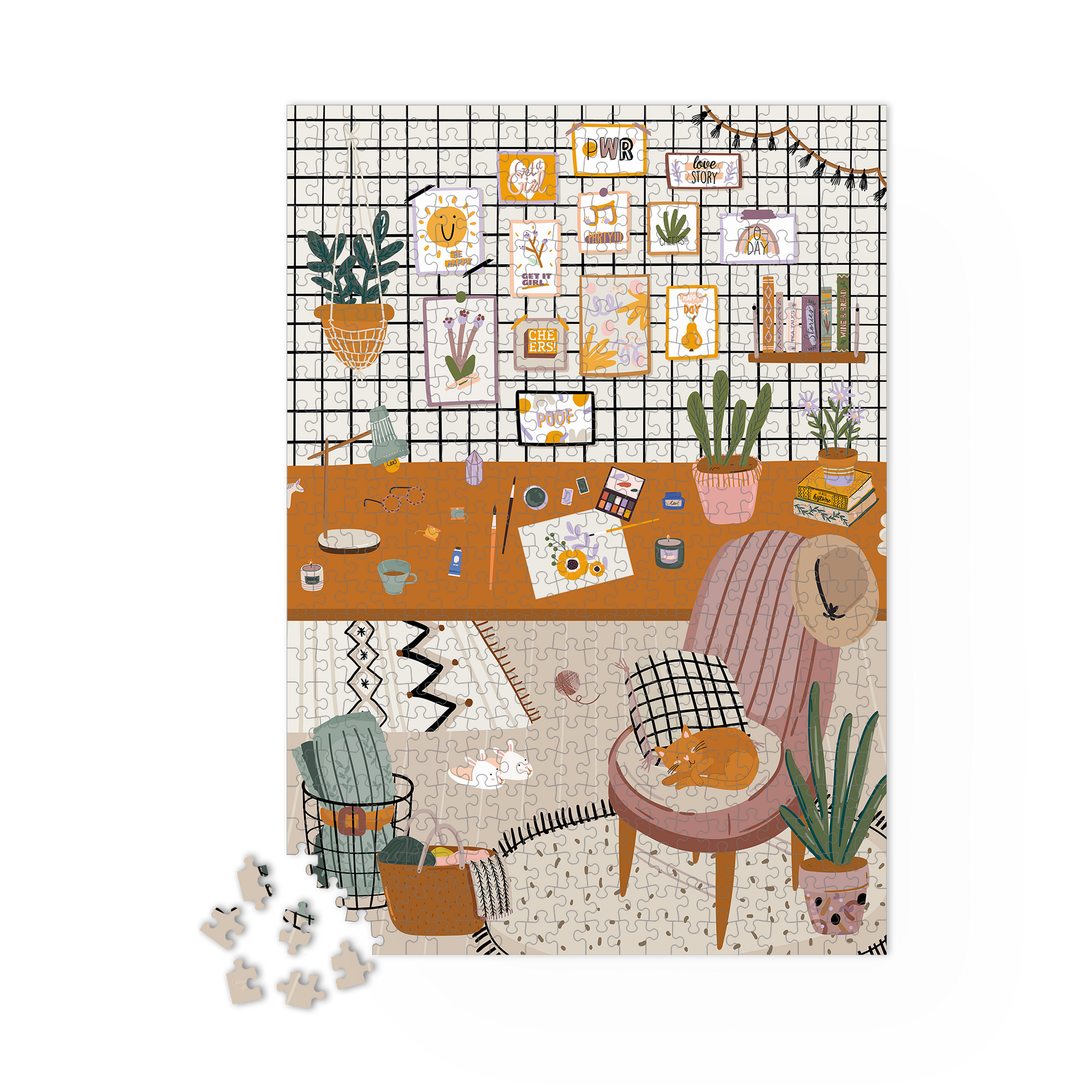 Puzzle L’Atelier en cours d’assemblage sur une table. Pièces du cadre déjà posées.