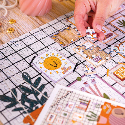 Gros plan sur les pièces du Puzzle 1000 pièces L’Atelier. Découpe classique et ajustement parfait.