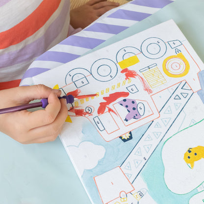 Enfant réalisant une peinture au numéro Wouf