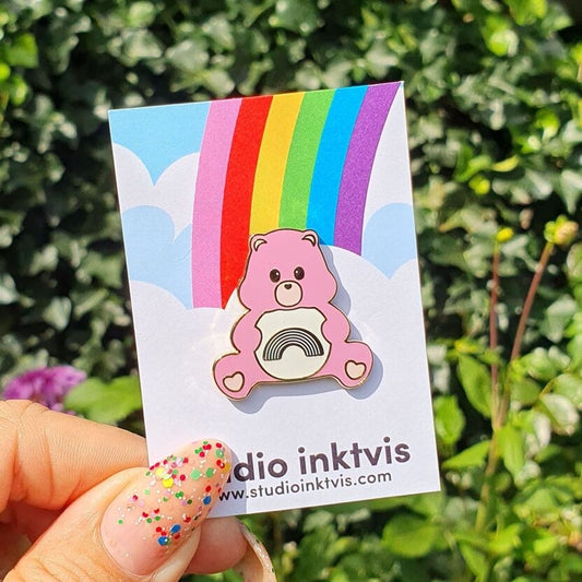 Pin’s Care Bears Arc-en-ciel – Bisounours rose envoyant des arcs-en-ciel studio inktvis