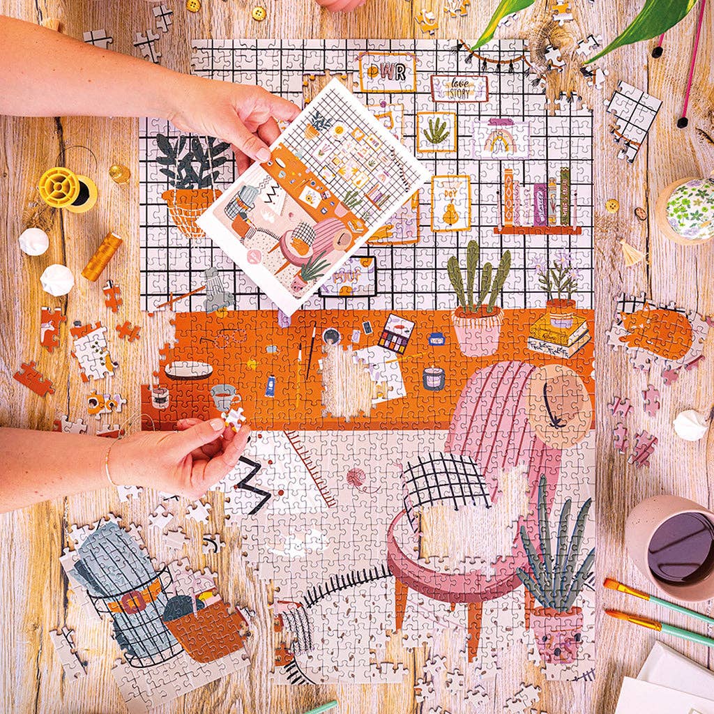 Puzzle 1000 pièces L’Atelier présenté comme idée cadeau  pour amateurs de puzzles et d’art.