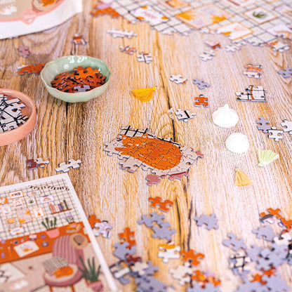 Puzzle 1000 pièces L’Atelier ouvert, pièces en vrac prêtes à assembler.